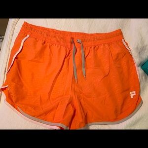 Orange running shorts